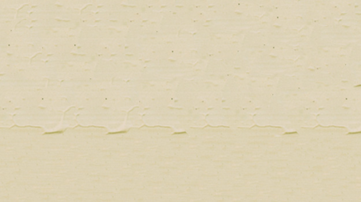  A wall painted beige long ago is showing signs of wrinkling. 
