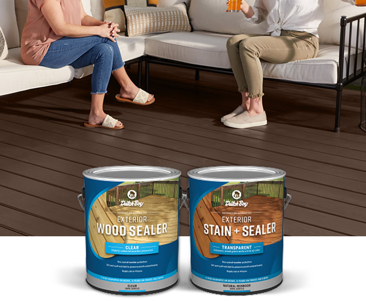 Deck floor stained brown with a couch and people. One-gallon cans of Exterior Stain + Sealer, Exterior Wood Sealer.